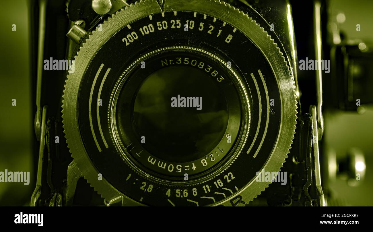 Leipzig, Saxonia, Germany - October 1, 2020: Old scratched and dusty photo camera, with foldable original Carl Zeiss Lens. Camera Lense 50mm antique, Stock Photo