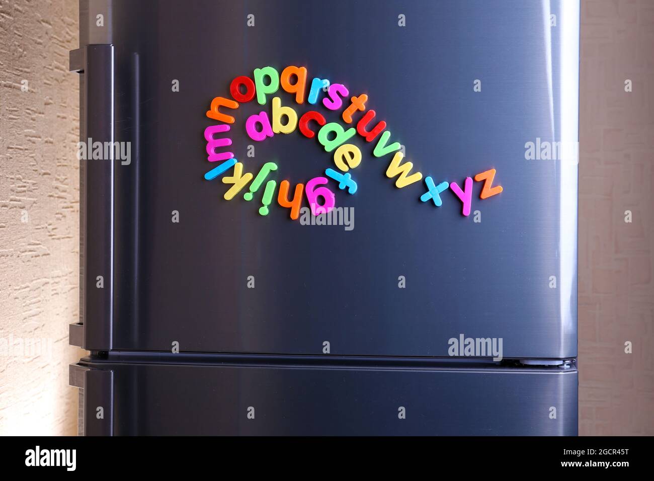 Colorful letters on refrigerator Stock Photo Alamy