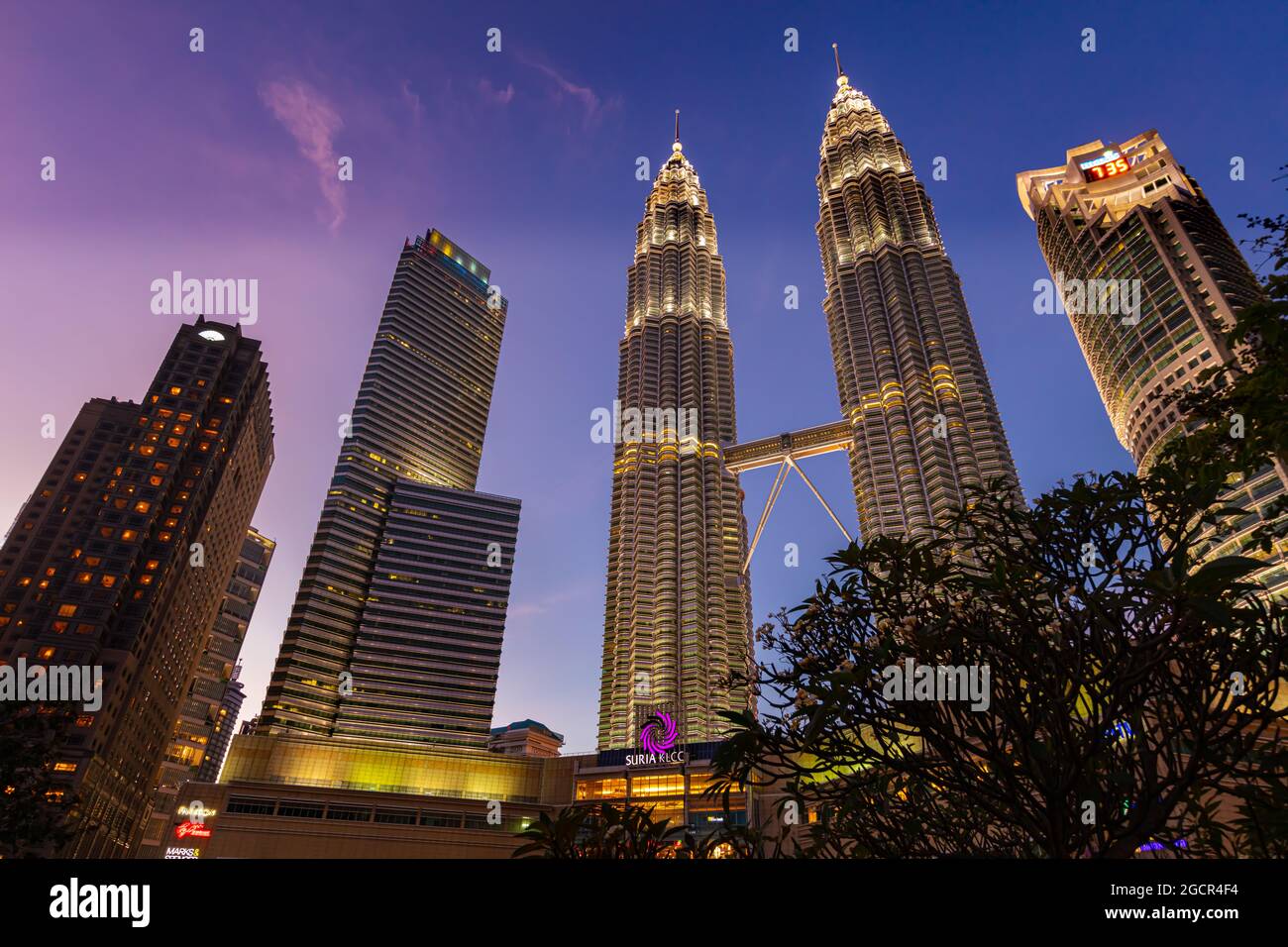 Kuala Lumpur, Malaysia - November 28, 2020: At night at the Petronas tower or twin towers in the heart of the South East Asia metropolis. Suria KL tow Stock Photo