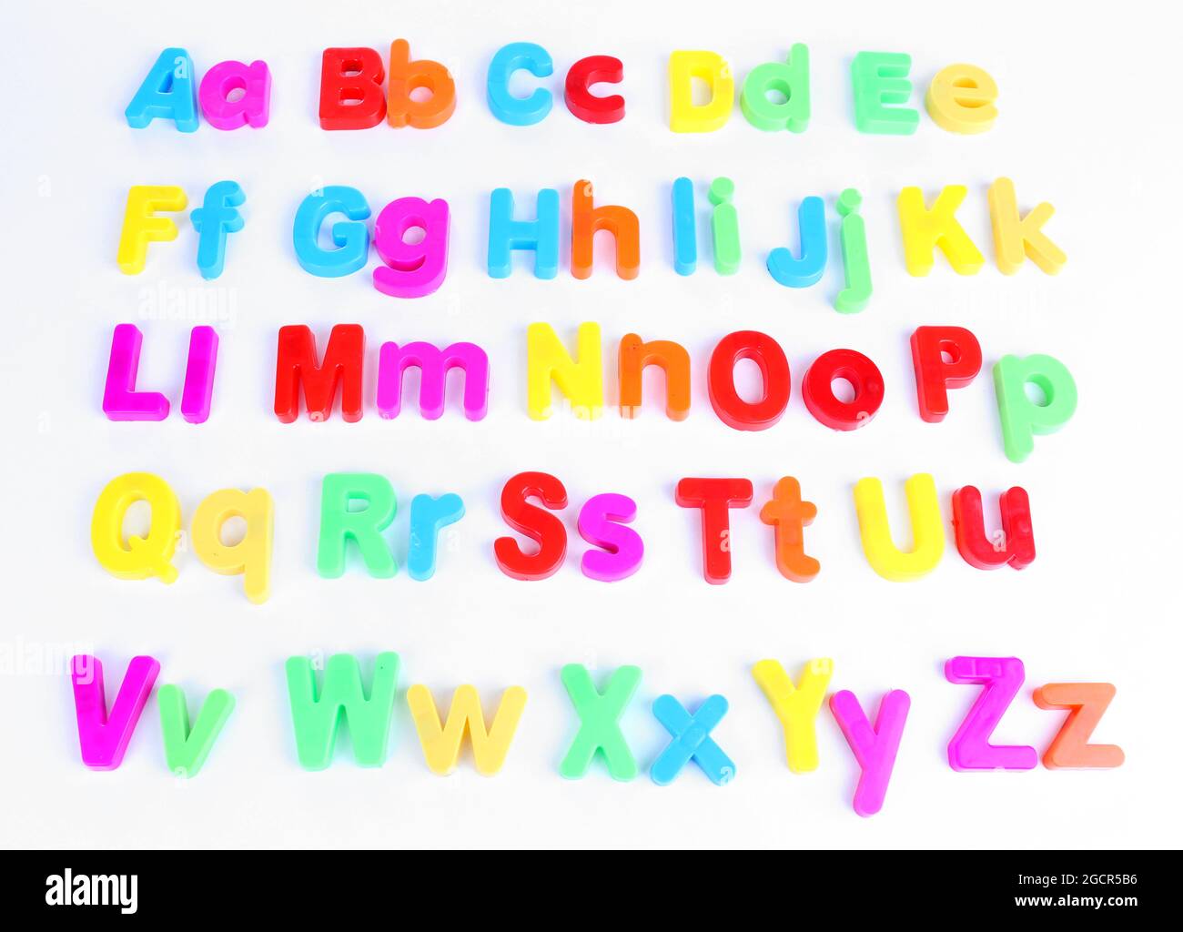 Colorful magnetic letters isolated on white Stock Photo - Alamy