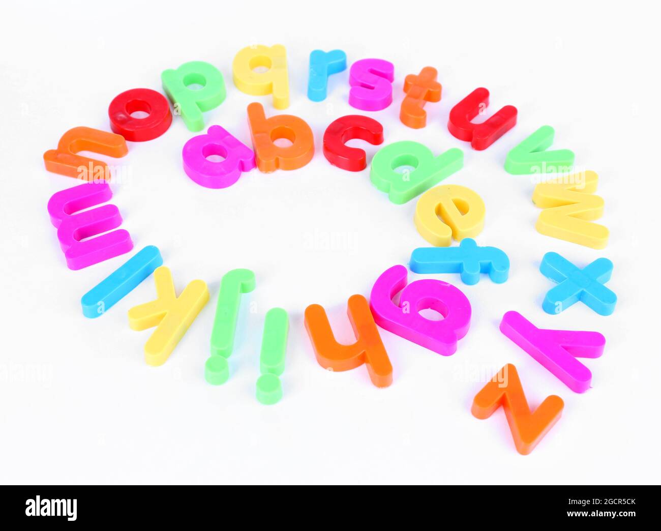 Colorful magnetic letters isolated on white Stock Photo - Alamy