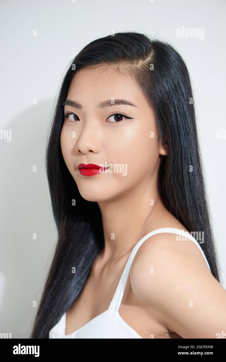 portrait of a beautiful asian girl with a serious face Stock Photo