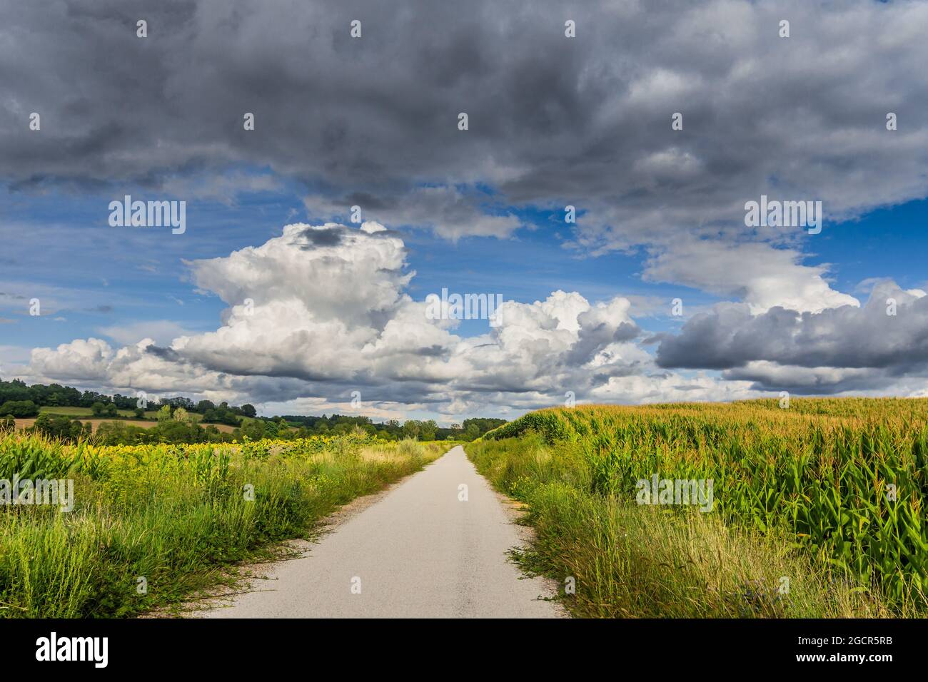 Cumulus storm clouds over rural farmland in central France. Stock Photo