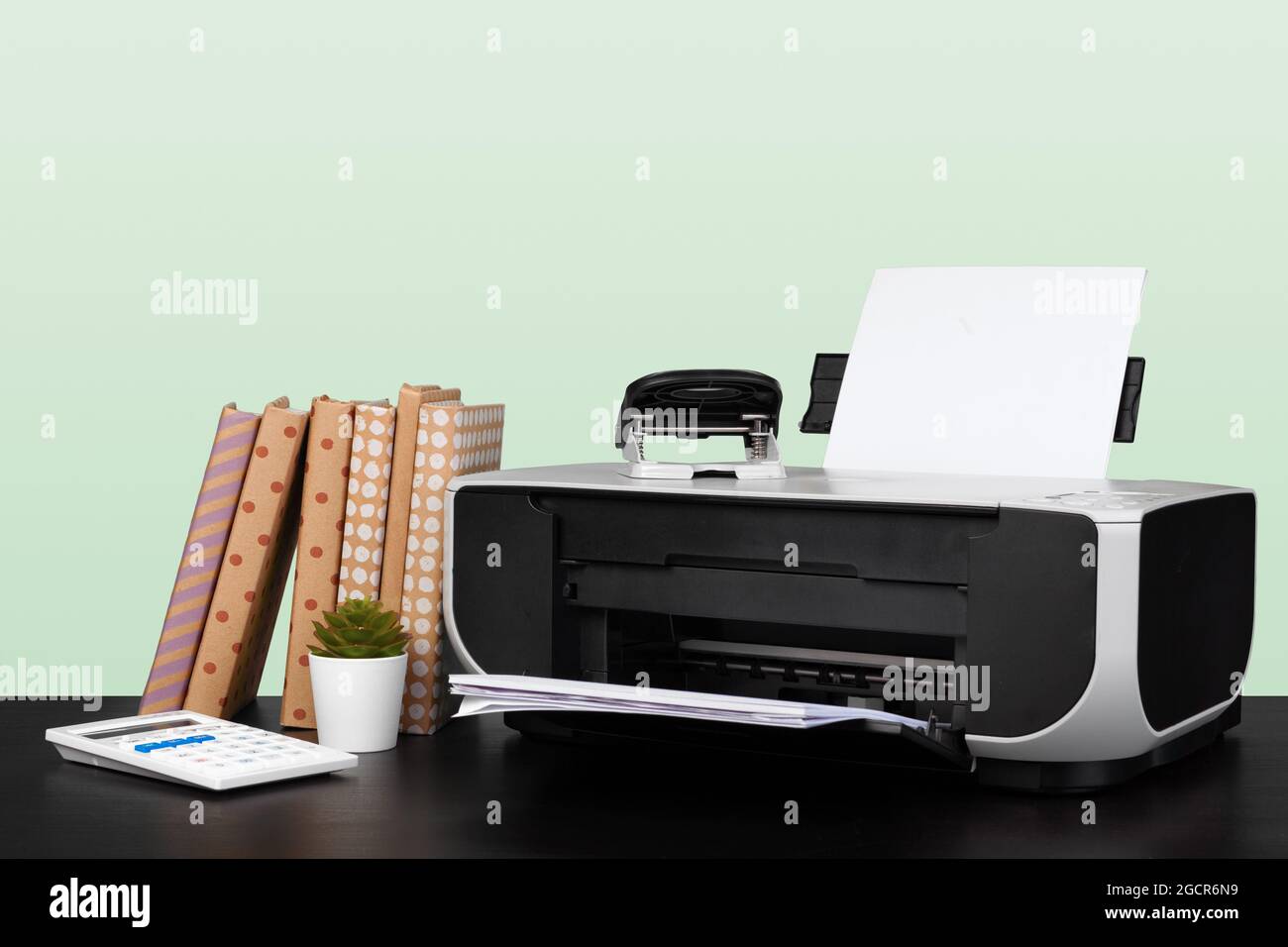 Compact home laser printer against gray background Stock Photo