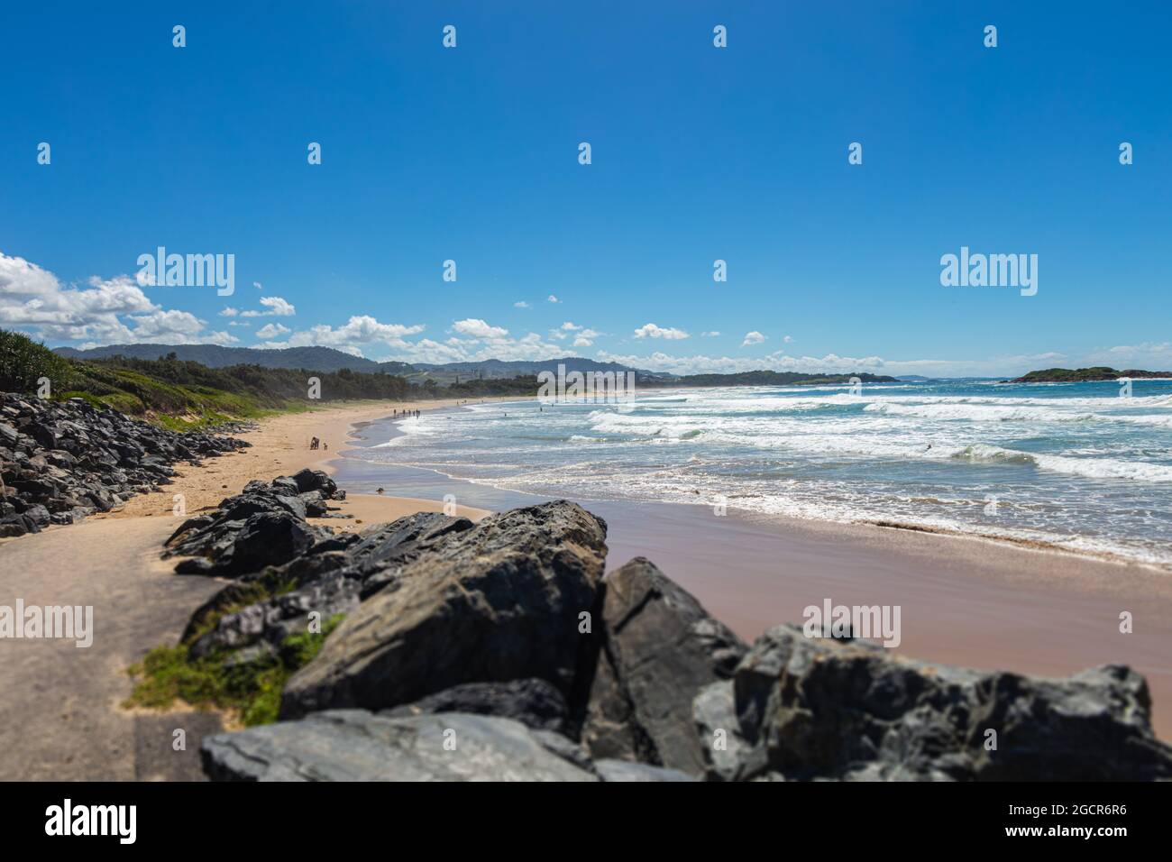 View over the shoreline of Sunshine Coast, Queensland, Australia. Panorama of the beaches of the Australian pacific coast. Waves hits the beach. Small Stock Photo