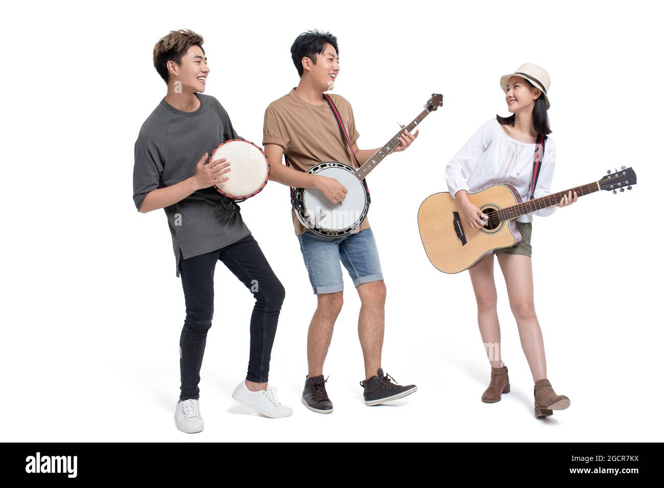 Young people playing musical instrument Stock Photo - Alamy
