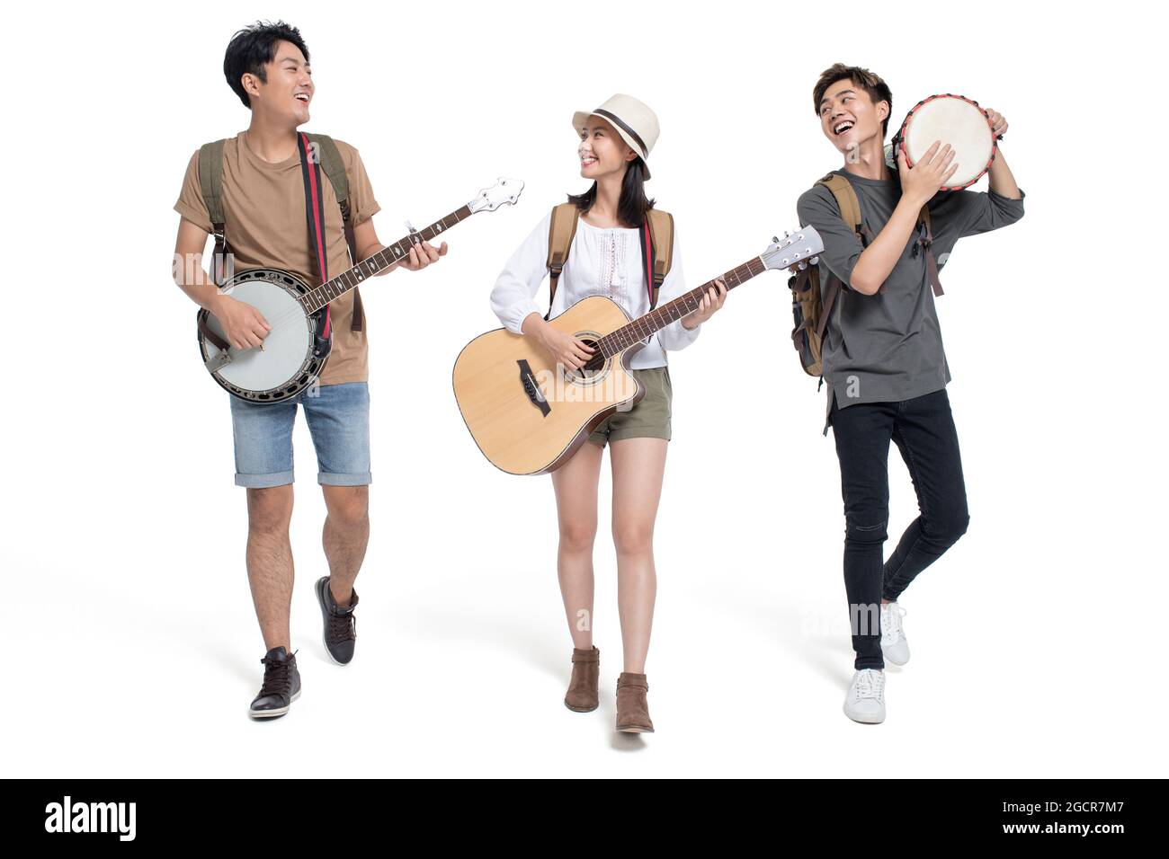 Young people playing musical instrument Stock Photo - Alamy