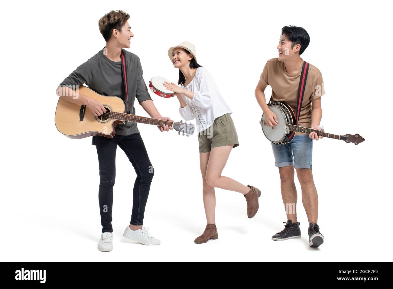 Young people playing musical instrument Stock Photo - Alamy