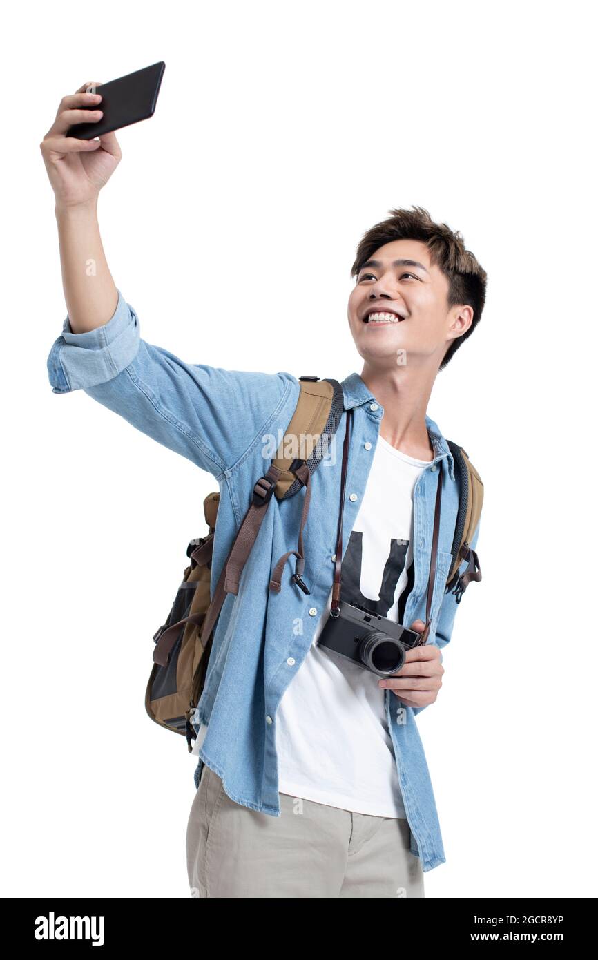 Young university student taking selfie with smartphone Stock Photo
