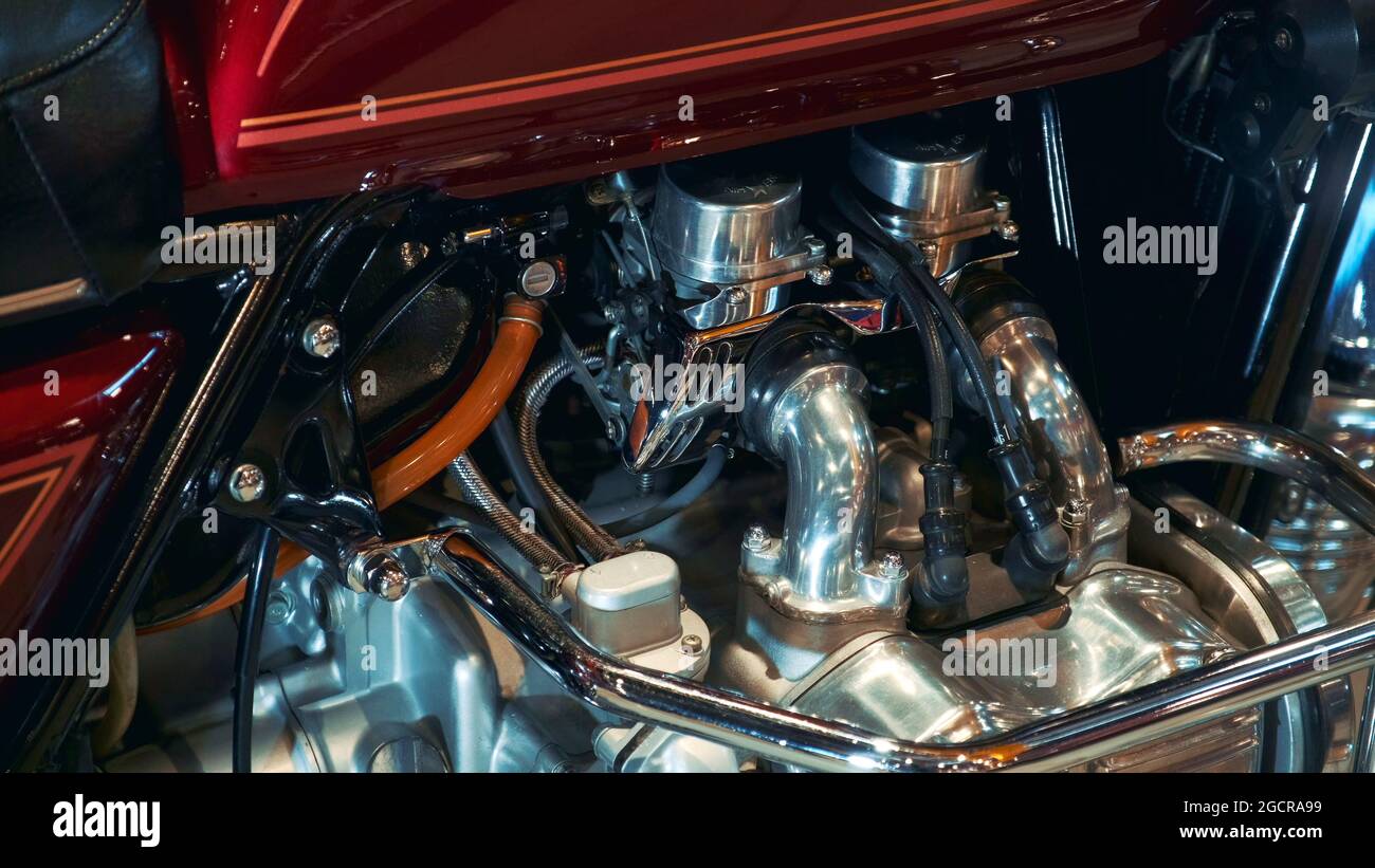Close-up of motorbike internal combustion engine, polished and shining. Warsaw, Poland - July 10, 2019 Stock Photo