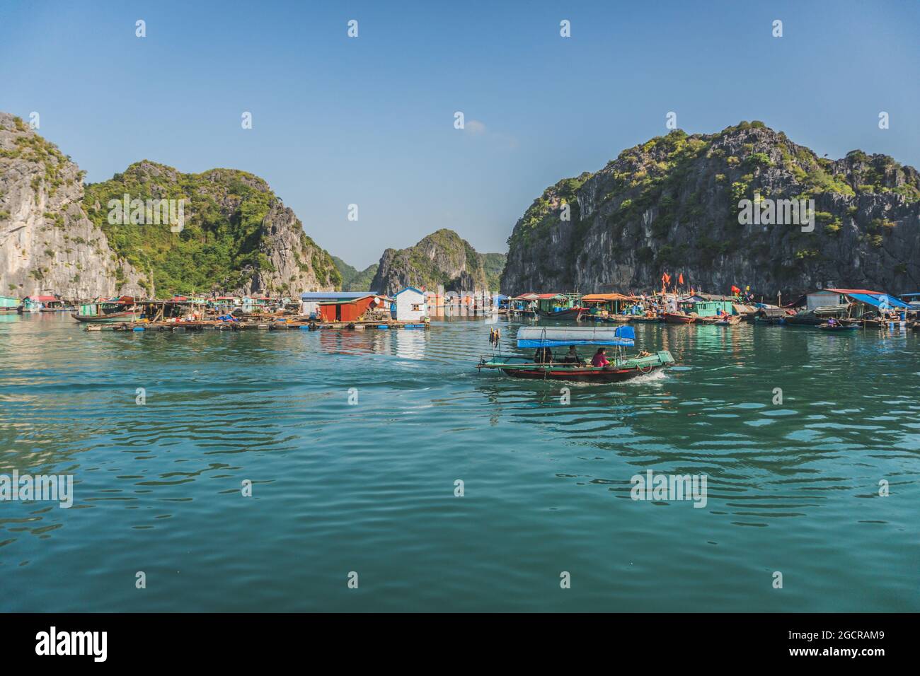 Floating Fishing Village In The Ha Long Bay. Cat Ba Island, Vietnam