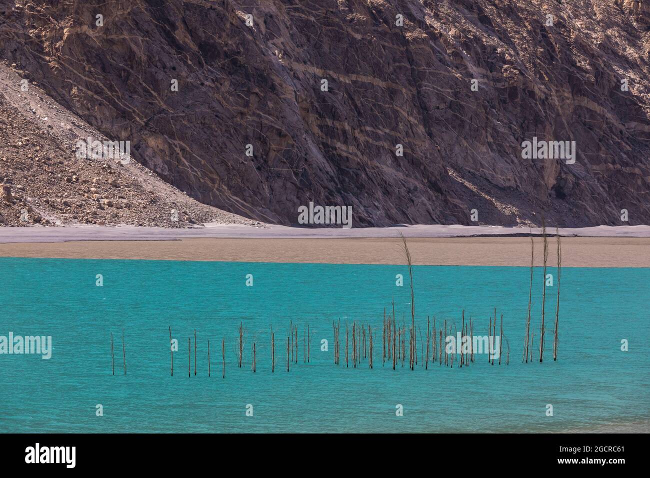 Turquoise water of mountain lake rocky shores Stock Photo
