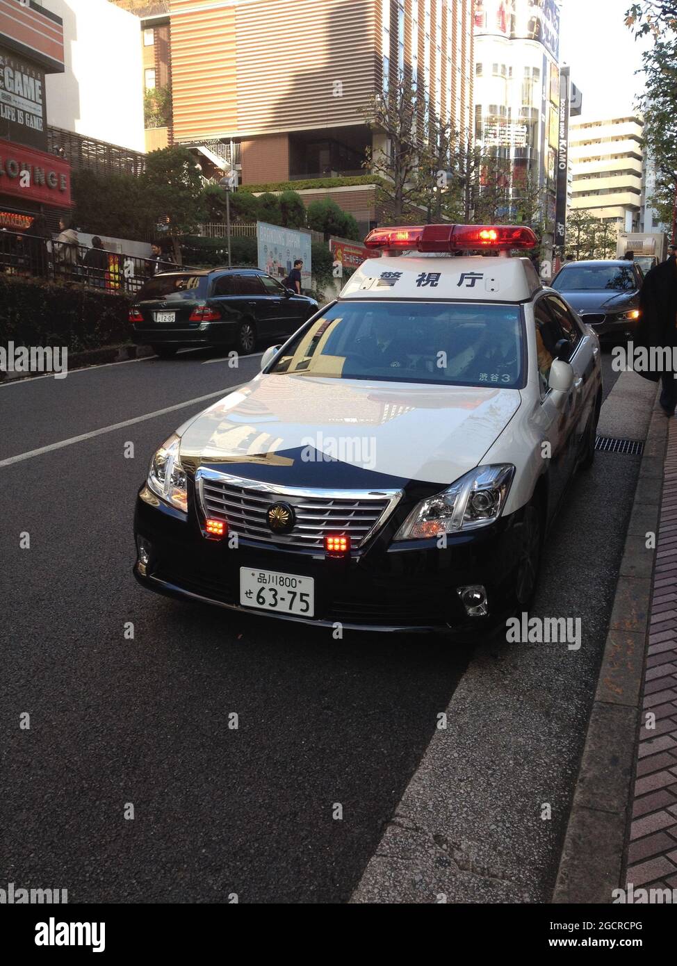 TOKYO, JAPAN - Nov 13, 2013: The Japanese police car in a quiet street in Tokyo, Japan Stock Photo