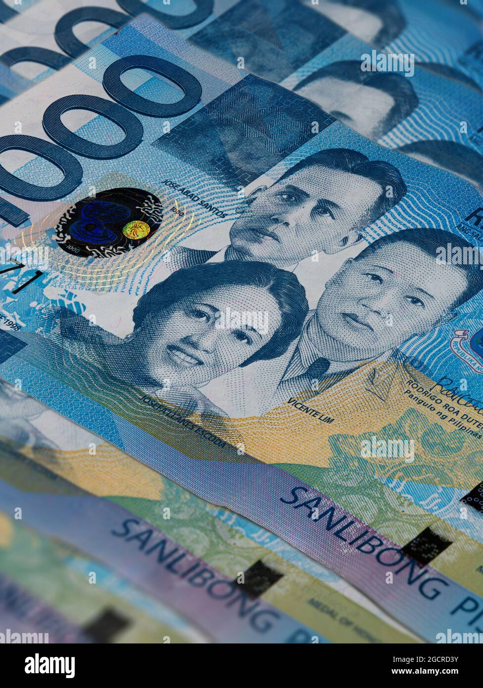 Front side of 1000 peso bill of the Philippines.A fan of 1000 Philippine Peso. Currency of the Island state. Bunch of thousand  Peso. Paper money or b Stock Photo