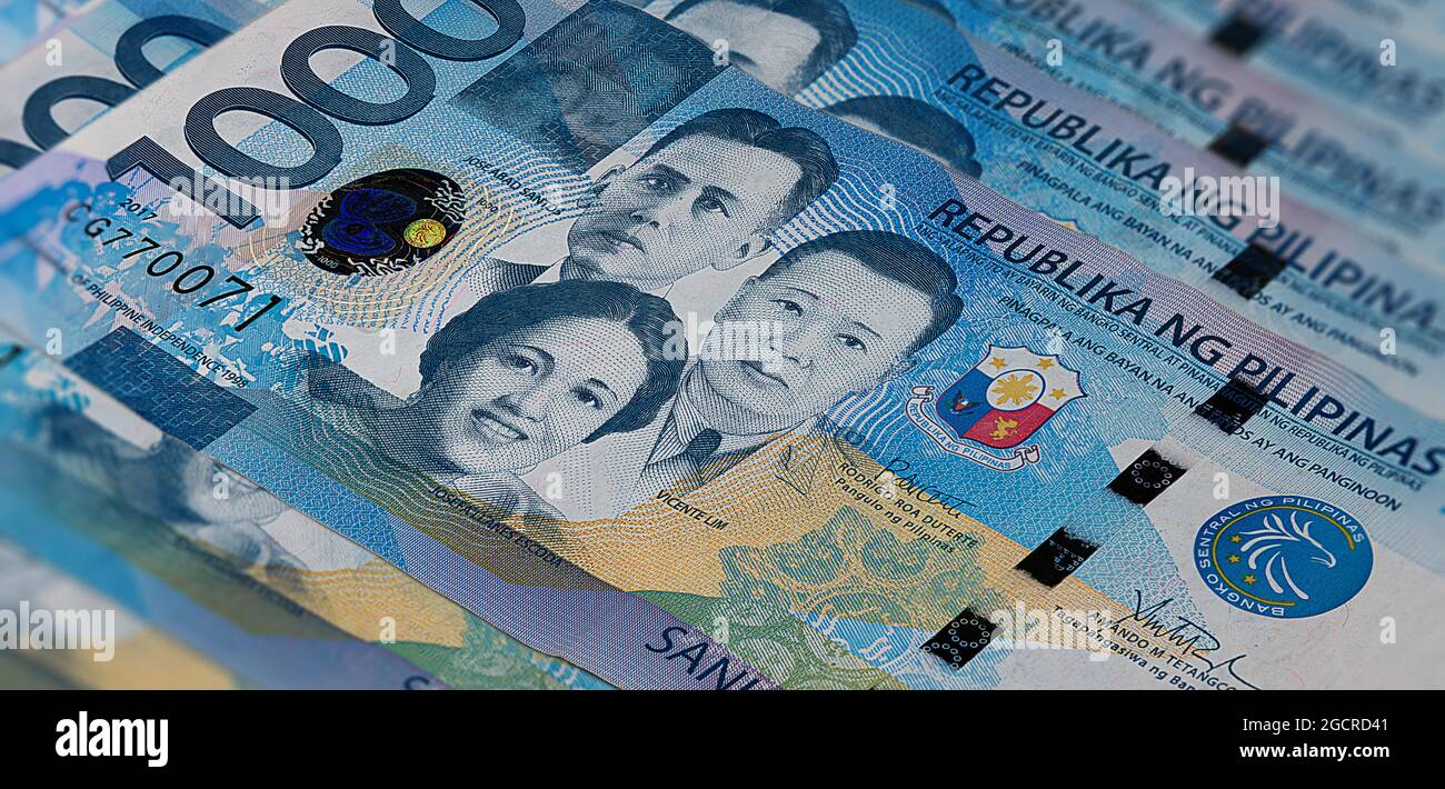 Front side of 1000 peso bill of the Philippines.A fan of 1000 Philippine Peso. Currency of the Island state. Bunch of thousand  Peso. Paper money or b Stock Photo