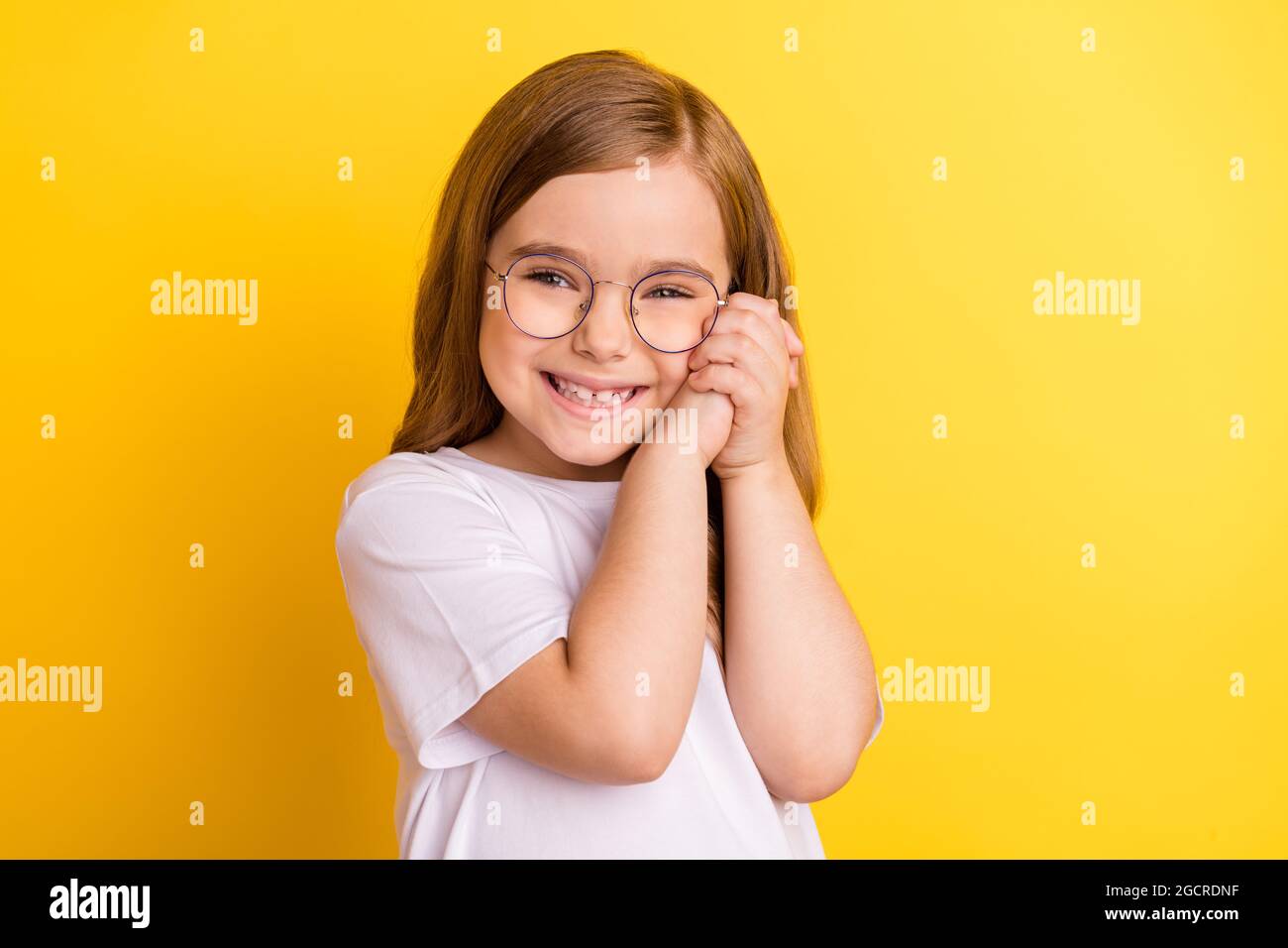 Photo of young little pretty girl happy positive smile hands touch ...