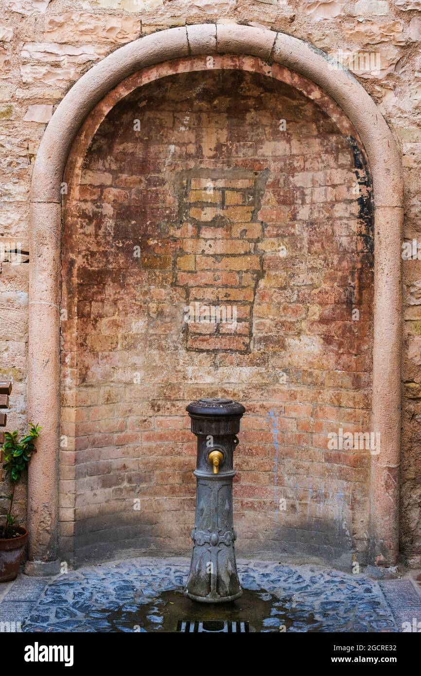 Water fountain in Spello Umbria Italy Stock Photo