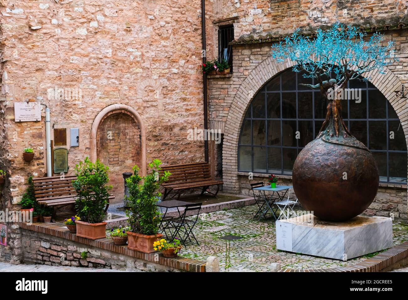 Tree of Life sculpture in Piazzetta Guiseppe Mazzoni in Spello in Umbria Italy Stock Photo