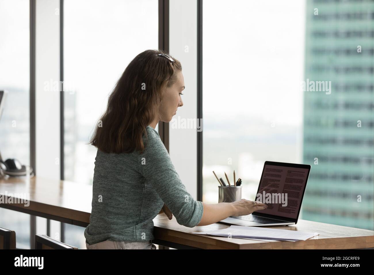 Gen Z student girl typing text on laptop Stock Photo - Alamy