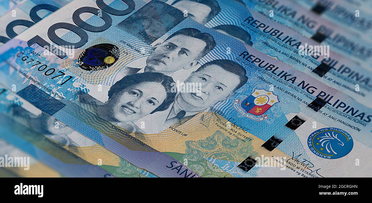 Front side of 1000 peso bill of the Philippines.A fan of 1000 Philippine Peso. Currency of the Island state. Bunch of thousand  Peso. Paper money or b Stock Photo