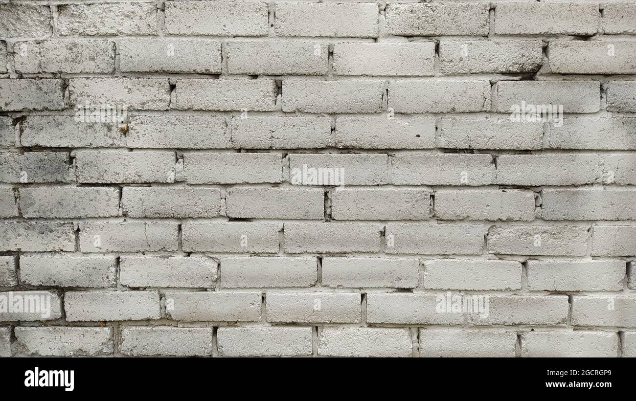 Old grunge stone wall texture background Stock Photo - Alamy