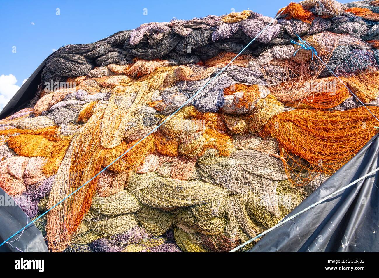 Fishing nets and floats, commercial fishing equipment in a heap on a  quayside. - Stock Photo - Masterfile - Premium Royalty-Free, Code:  6118-09166281