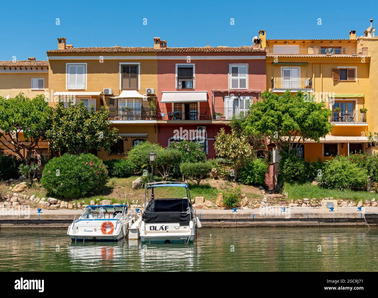 Yachts and colurful houses, Port Saplaya, Alboraya, Valencia, Spain Stock Photo