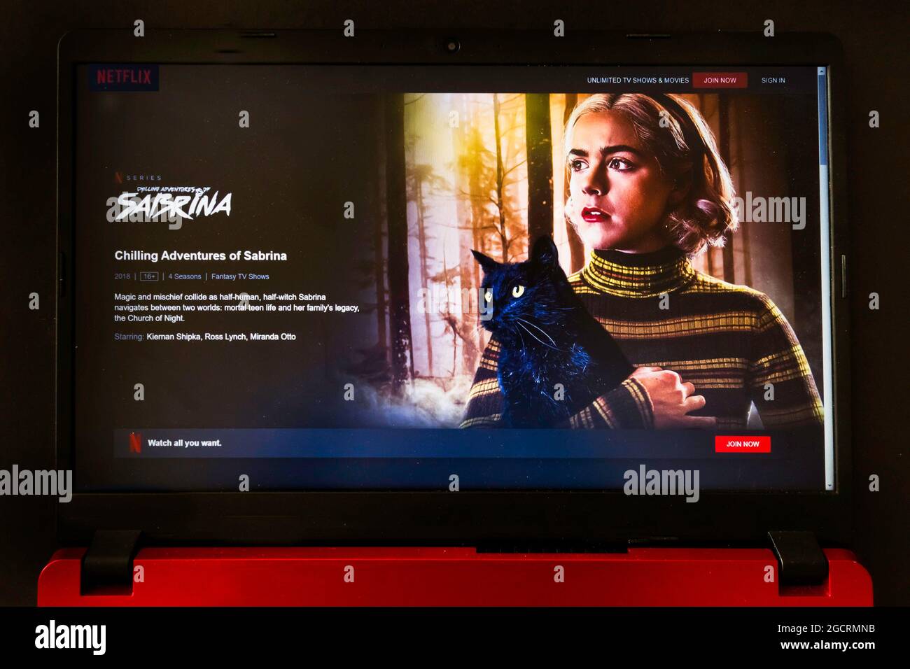 laptop screen with Netflix tv series Sabrina Stock Photo