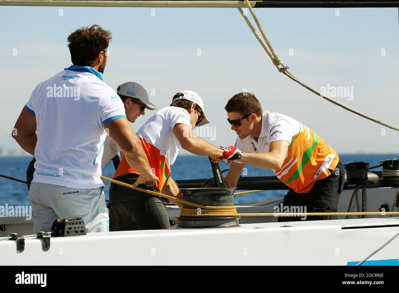 (L to R): Nico Hulkenberg (GER) Sahara Force India F1 and Paul di Resta (GBR) Sahara Force India F1 on the Aethra America's Cup Boat. European Grand Prix, Thursday 21st June 2012. Valencia, Spain. Stock Photo