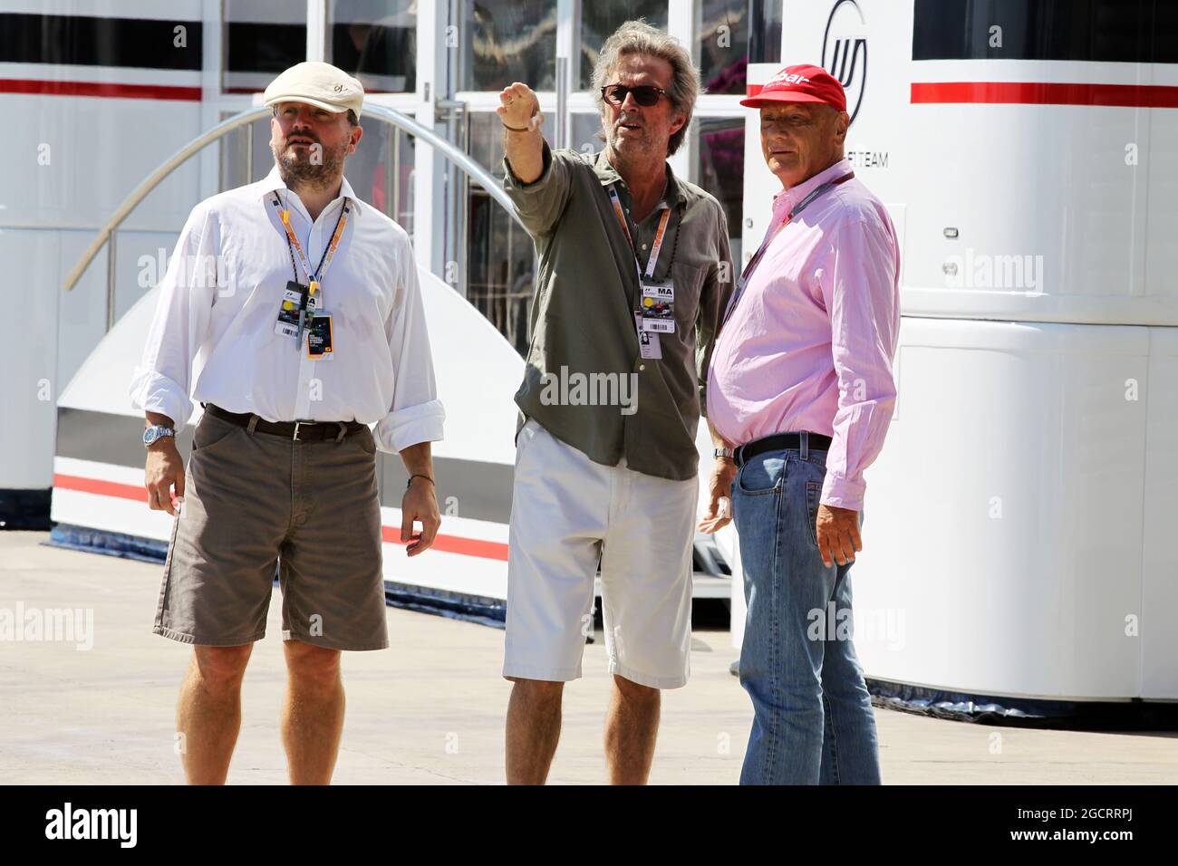 Eric Clapton (GBR) Rock Legend (Centre) with Niki Lauda (AUT) (Right). European Grand Prix, Sunday 24th June 2012. Valencia, Spain. Stock Photo