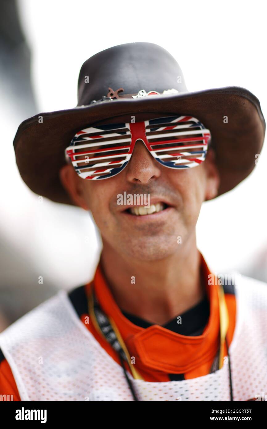 A marshal with Union Jack glasses. British Grand Prix, Saturday 7th July 2012. Silverstone, England. Stock Photo