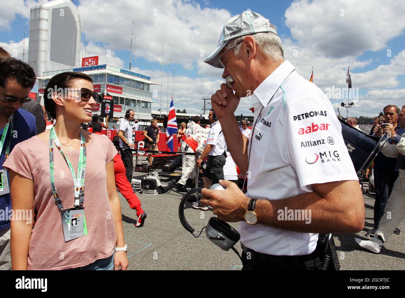 Dr. Dieter Zetsche (GER) Daimler AG CEO with his family on the grid. German Grand Prix, Sunday 22nd July 2012. Hockenheim, Germany. Stock Photo