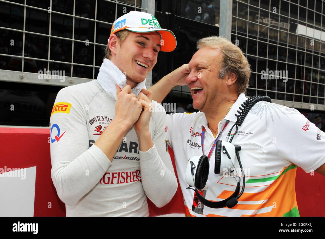 (L to R): Nico Hulkenberg (GER) Sahara Force India F1 on the grid with Robert Fearnley (GBR) Sahara Force India F1 Team Deputy Team Principal. Indian Grand Prix, Sunday 28th October 2012. Greater Noida, New Delhi, India. Stock Photo