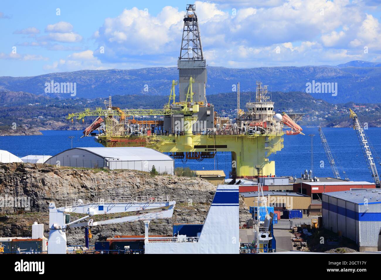 Offshore drilling rig maintenance in a fiord near Bergen, Norway. Oil industry structure. Stock Photo