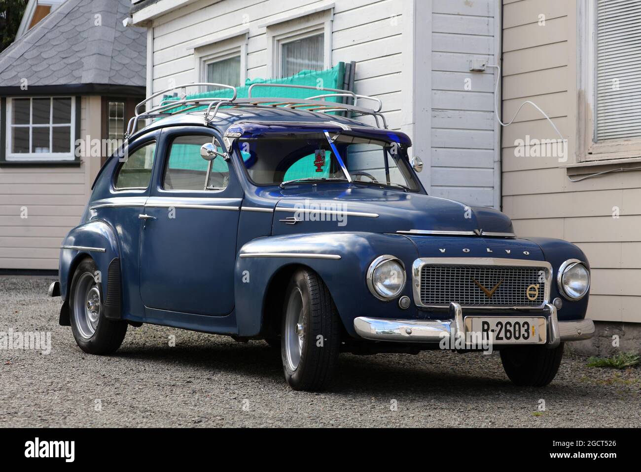 FLEKKEFJORD, NORWAY - JULY 19, 2020: Volvo Duett oldtimer car parked in Norway. There are 2.8 million cars registered in Norway (2019). Stock Photo