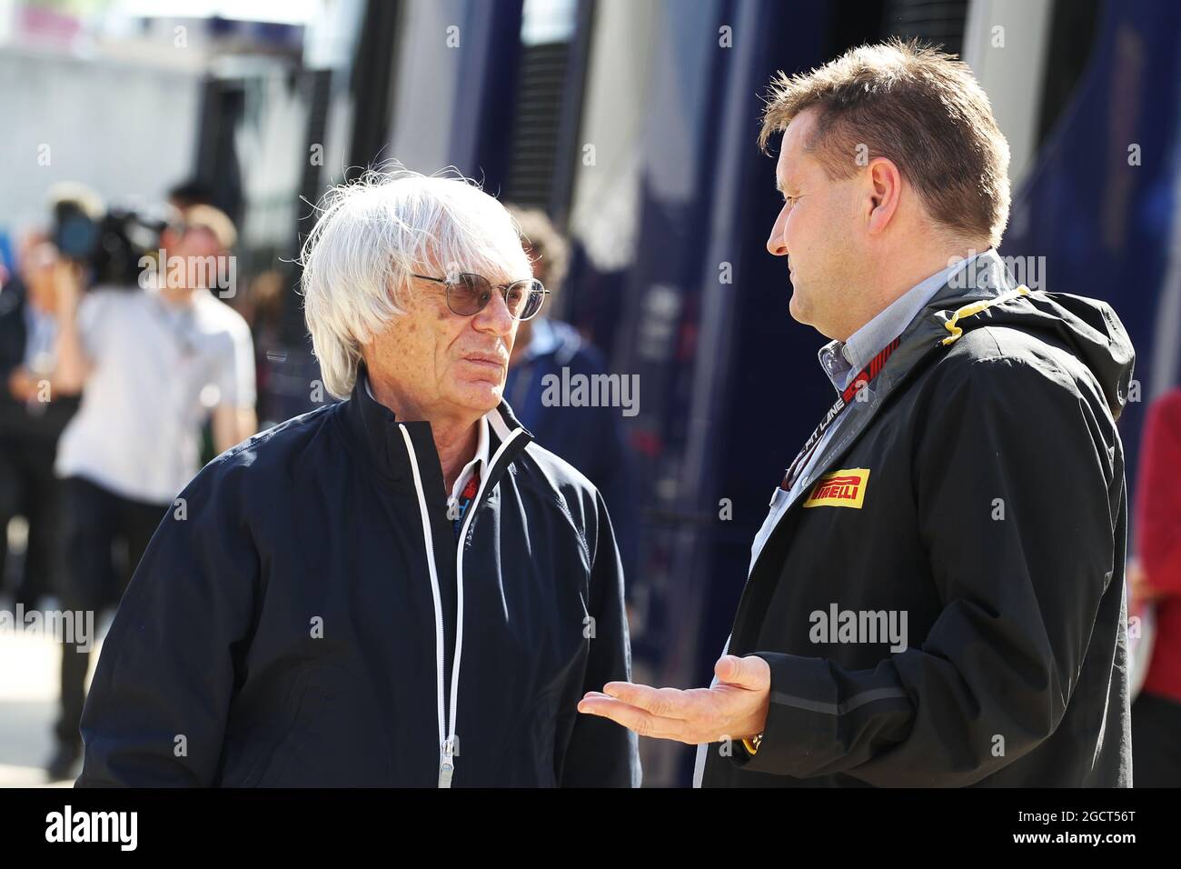 (L to R): Bernie Ecclestone (GBR) CEO Formula One Group (FOM) with Paul Hembery (GBR) Pirelli Motorsport Director. British Grand Prix, Saturday 29th June 2013. Silverstone, England. Stock Photo