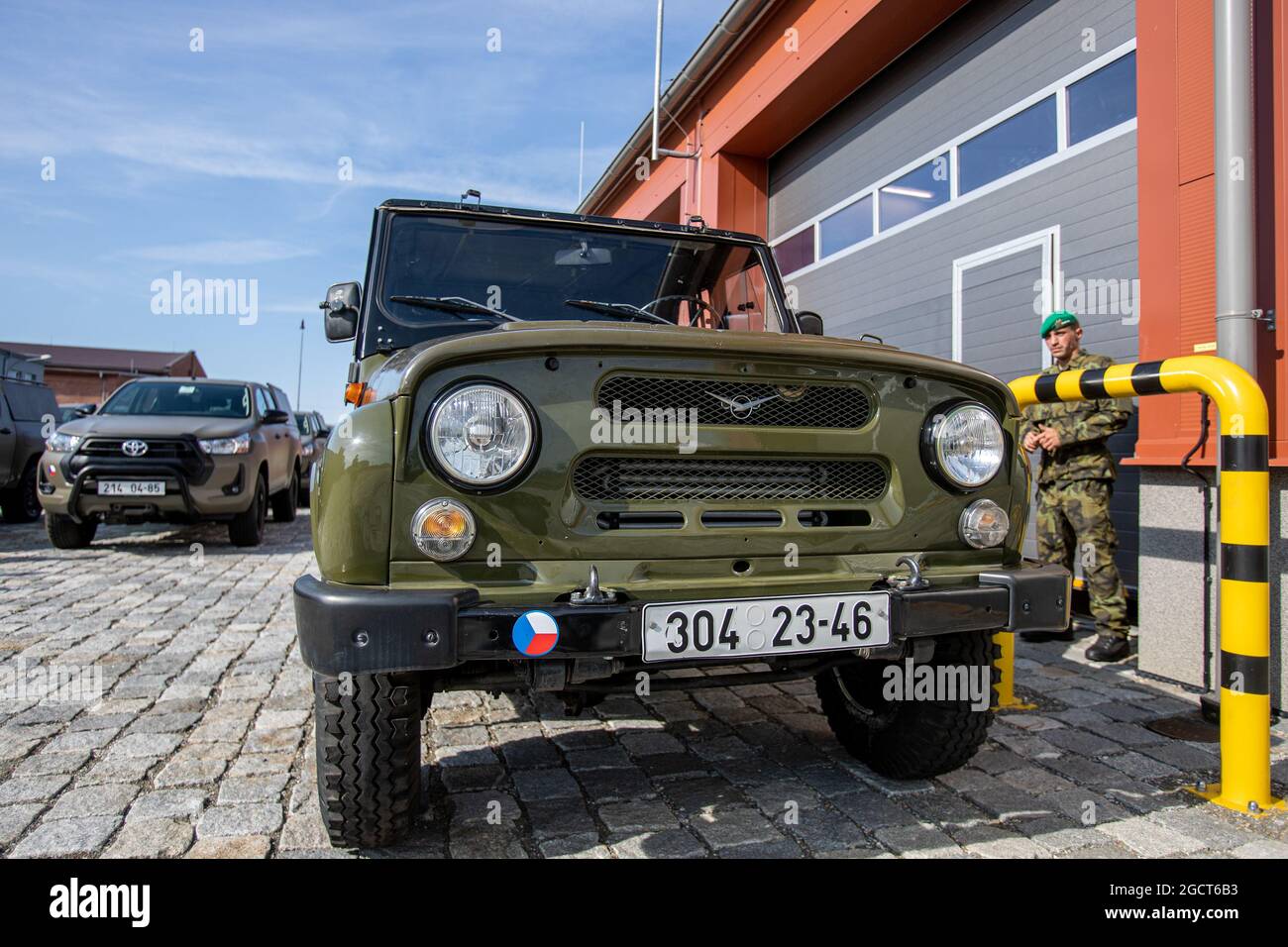 Stepanov, Czech Republic. 10th Aug, 2021. Czech Defence Ministry takes over new personal off-roads Toyota Hilux, left, on August 10, 2021, in Stepanov, Olomouc Region, Czech Republic. In the foreground is a UAZ-469 off-road vehicle, which the army now has in its equipment. Credit: Vladimir Prycek/CTK Photo/Alamy Live News Stock Photo