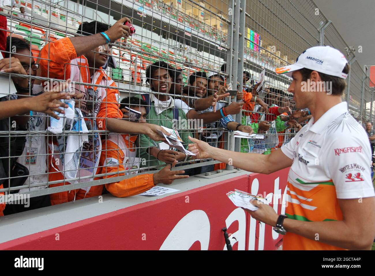 Adrian Sutil (GER) Sahara Force India F1 signs autographs for the fans. Indian Grand Prix, Thursday 24th October 2013. Greater Noida, New Delhi, India. Stock Photo