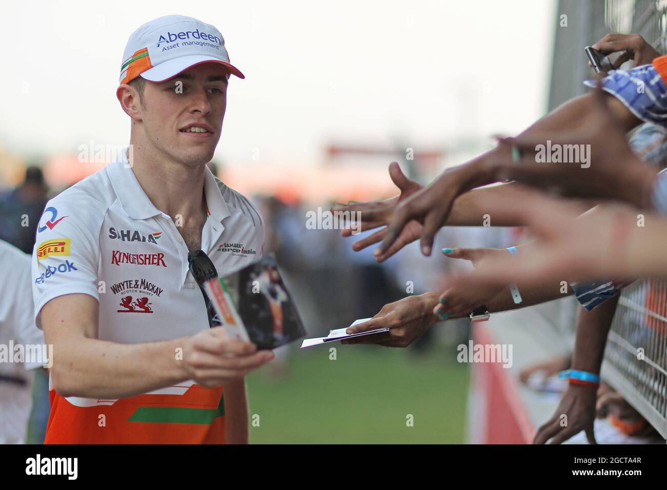 Paul di Resta (GBR) Sahara Force India F1 signs autographs for the fans. Indian Grand Prix, Thursday 24th October 2013. Greater Noida, New Delhi, India. Stock Photo