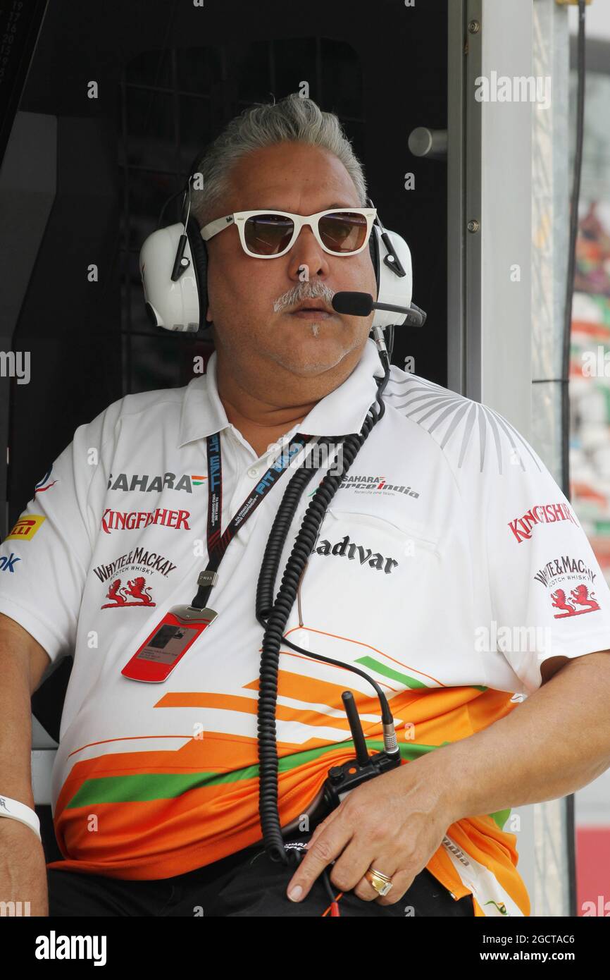Dr. Vijay Mallya (IND) Sahara Force India F1 Team Owner on the pit gantry. Indian Grand Prix, Saturday 26th October 2013. Greater Noida, New Delhi, India. Stock Photo