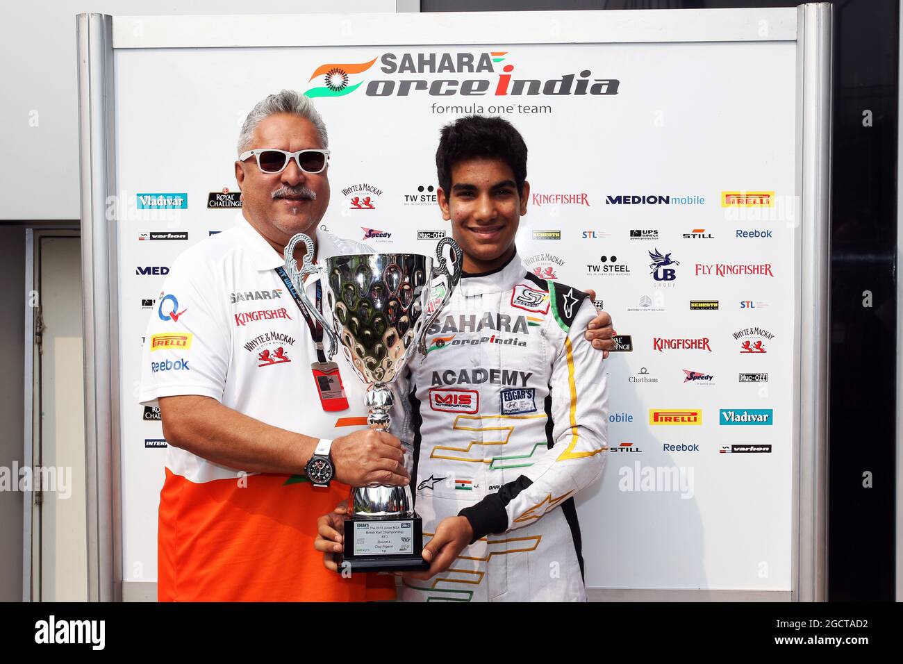 (L to R): Dr. Vijay Mallya (IND) Sahara Force India F1 Team Owner with Jehan Daruvala (IND) Sahara Force India Academy Driver, winner of the British KF3 Karting Championship. Indian Grand Prix, Saturday 26th October 2013. Greater Noida, New Delhi, India. Stock Photo