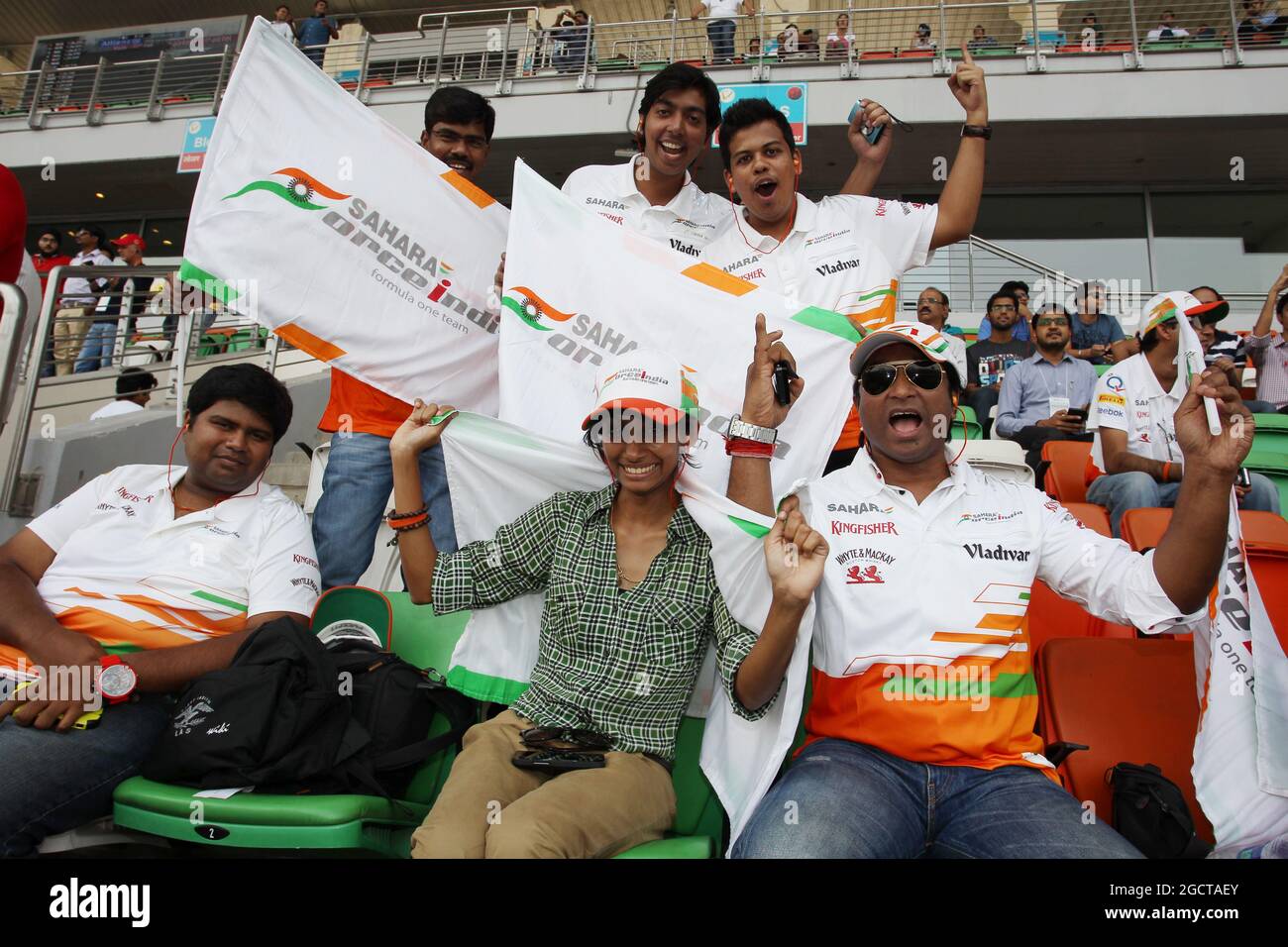 Sahara Force India F1 Team fans in the grandstand. Indian Grand Prix, Saturday 26th October 2013. Greater Noida, New Delhi, India. Stock Photo