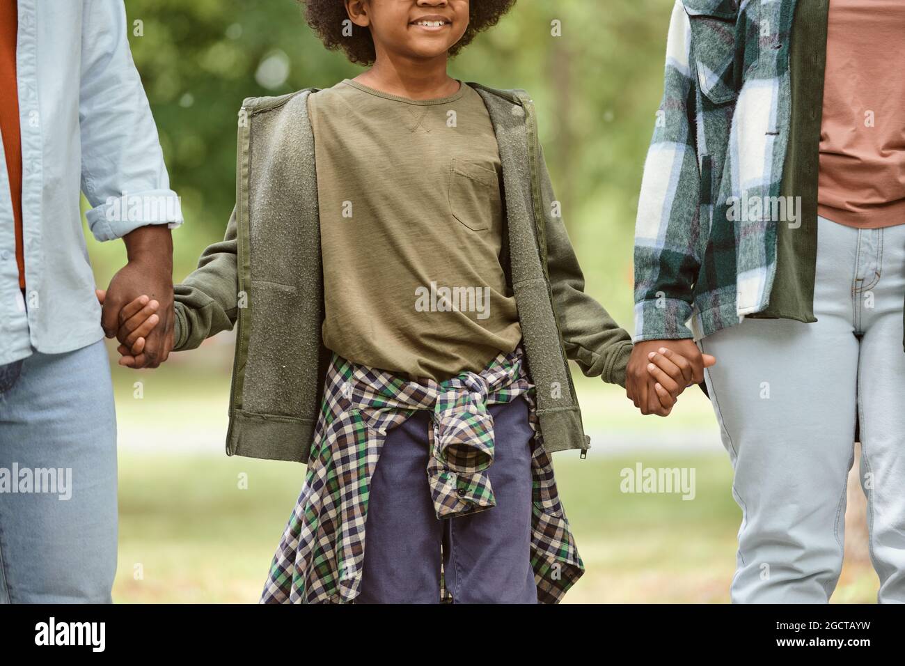 African father and son holding hands hi-res stock photography and ...