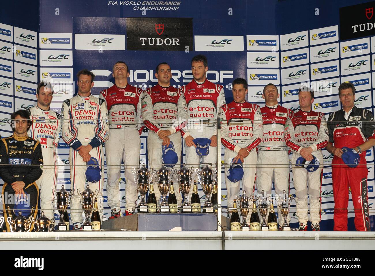 The podium (L to R): Nicolas Prost (FRA) Rebellion Racing, Lola B12/60 Coupe, Toyota; Nicolas Lapierre (FRA), Alexander Wurz (AUT) Toyota Racing, Toyota TS030, Hybrid, second; Marcel Fassler (SUI), Benoit Treluyer (FRA), Andre Lotterer (GER) Audi Sport Team Joest, Audi R18 e-tron quattro, race winners; Loic Duval (FRA), Tom Kristensen (DEN), Allan McNish (GBR) Audi Sport Team Joest, Audi R18 e-tron quattro, third and World Champions. FIA World Endurance Championship, Round 7, Saturday 9th November 2013. Shanghai, China. Stock Photo