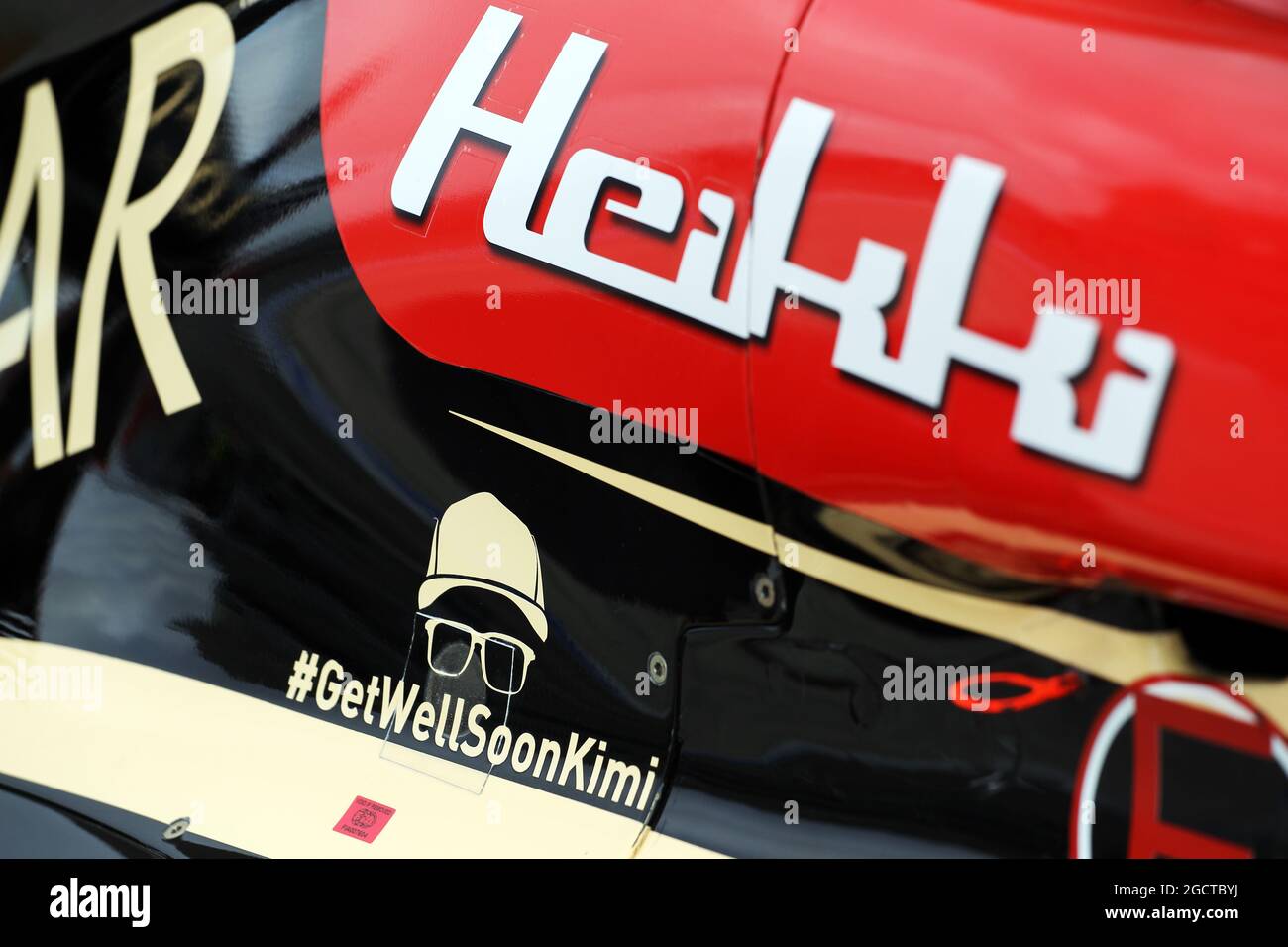 Get well soon message for Kimi Raikkonen (FIN) on the Lotus F1 E21 of Heikki Kovalainen (FIN). United States Grand Prix, Sunday 17th November 2013. Circuit of the Americas, Austin, Texas, USA. Stock Photo