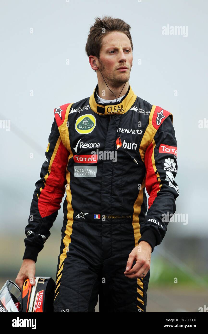Romain Grosjean (FRA) Lotus F1 Team walks back to the pits Romain Grosjean (FRA) Lotus F1 Team walks back to the pits