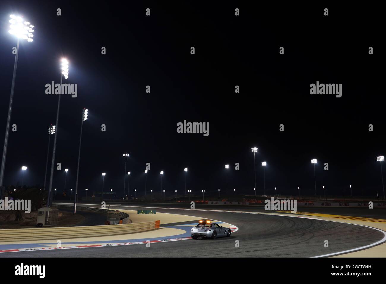 The fia safety car runs under floodlights at night hires stock