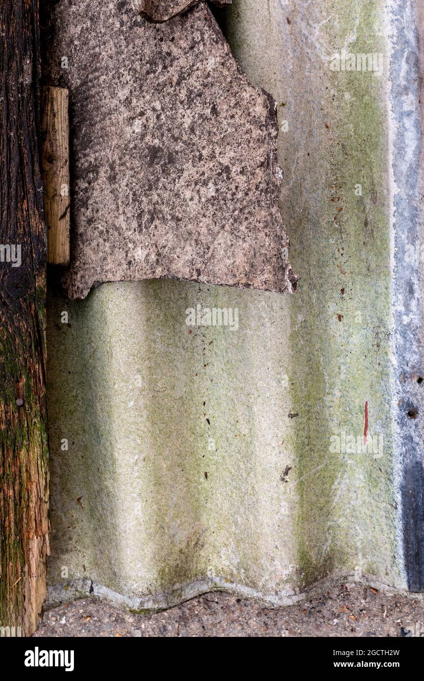 Old, used, corrugated asbestos panels. Stock Photo