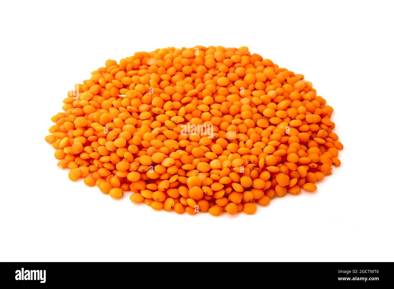 Red Lentils on a white background Stock Photo