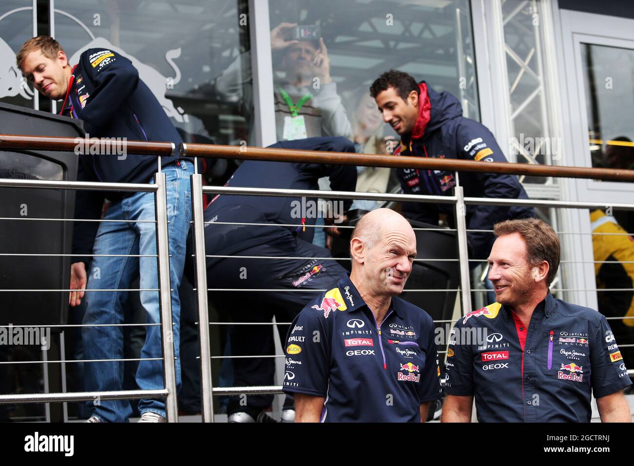 (L to R): Adrian Newey (GBR) Red Bull Racing Chief Technical Officer and Christian Horner (GBR) Red Bull Racing Team Principal take part in the ALS ice bucket challenge, with drivers Sebastian Vettel (GER) Red Bull Racing (Left) and Daniel Ricciardo (AUS) Red Bull Racing (Right) performing the honours. Belgian Grand Prix, Saturday 23rd August 2014. Spa-Francorchamps, Belgium. Stock Photo
